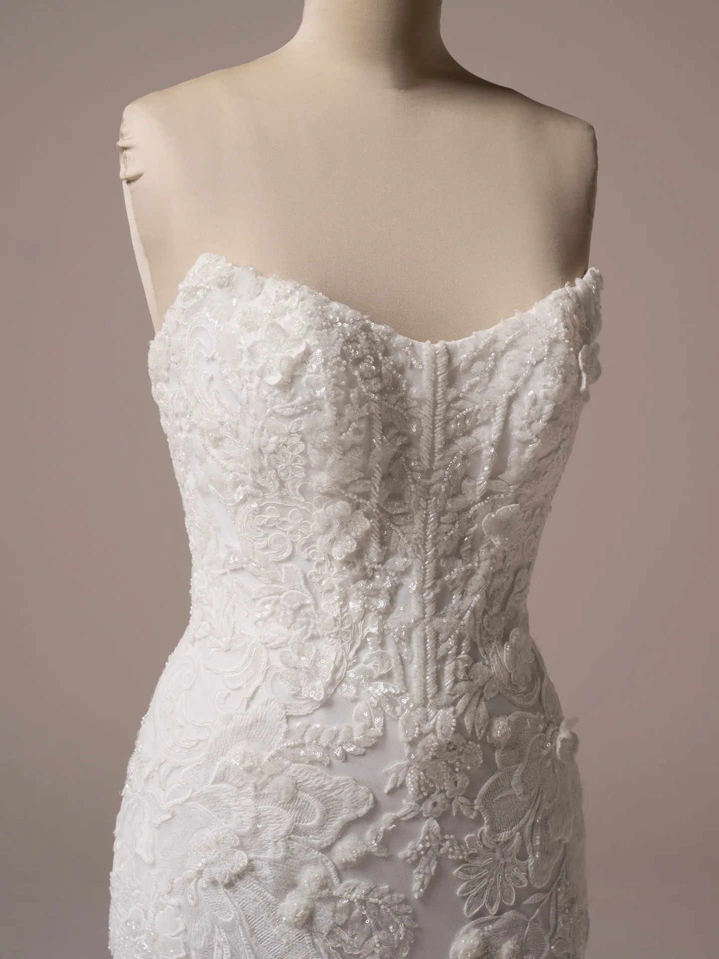 Sottero and Midgley Halle fit and flare wedding dress side angle with fitted waist and hips