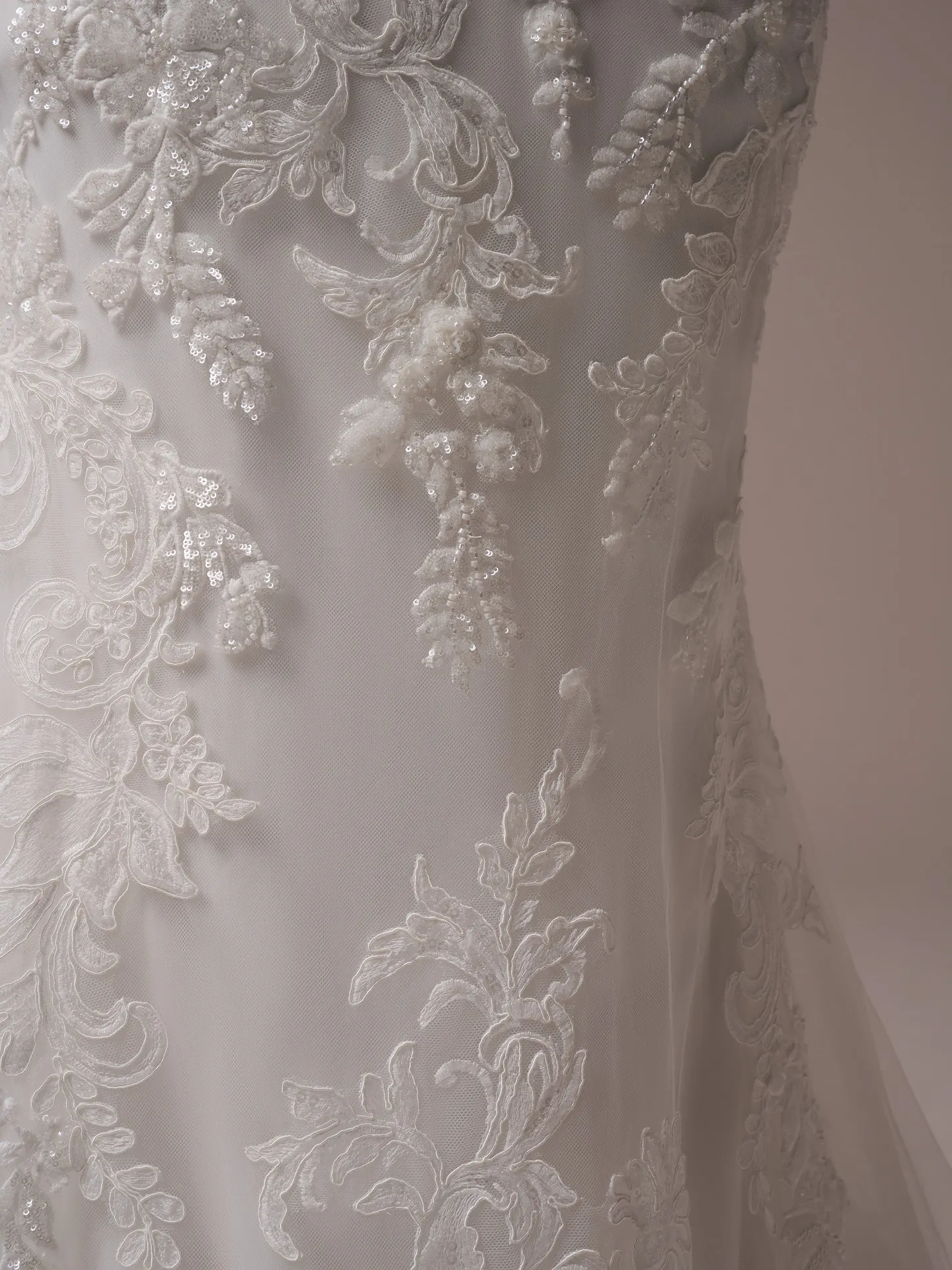 Sottero and Midgley Halle fit and flare wedding dress back angle with lace train flowing outward