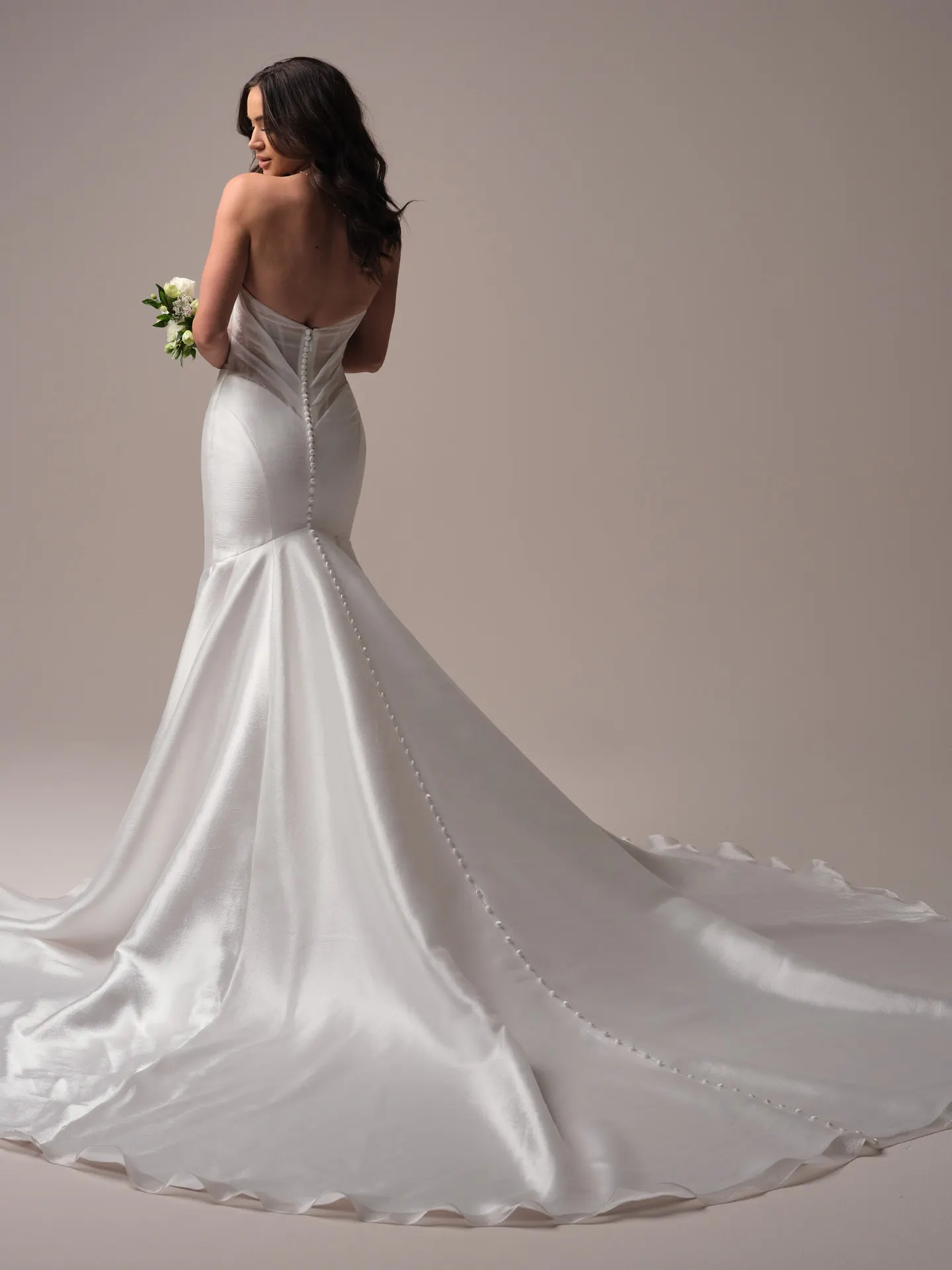 Sottero and Midgley Lagos back view, mermaid dress with long train and buttons.