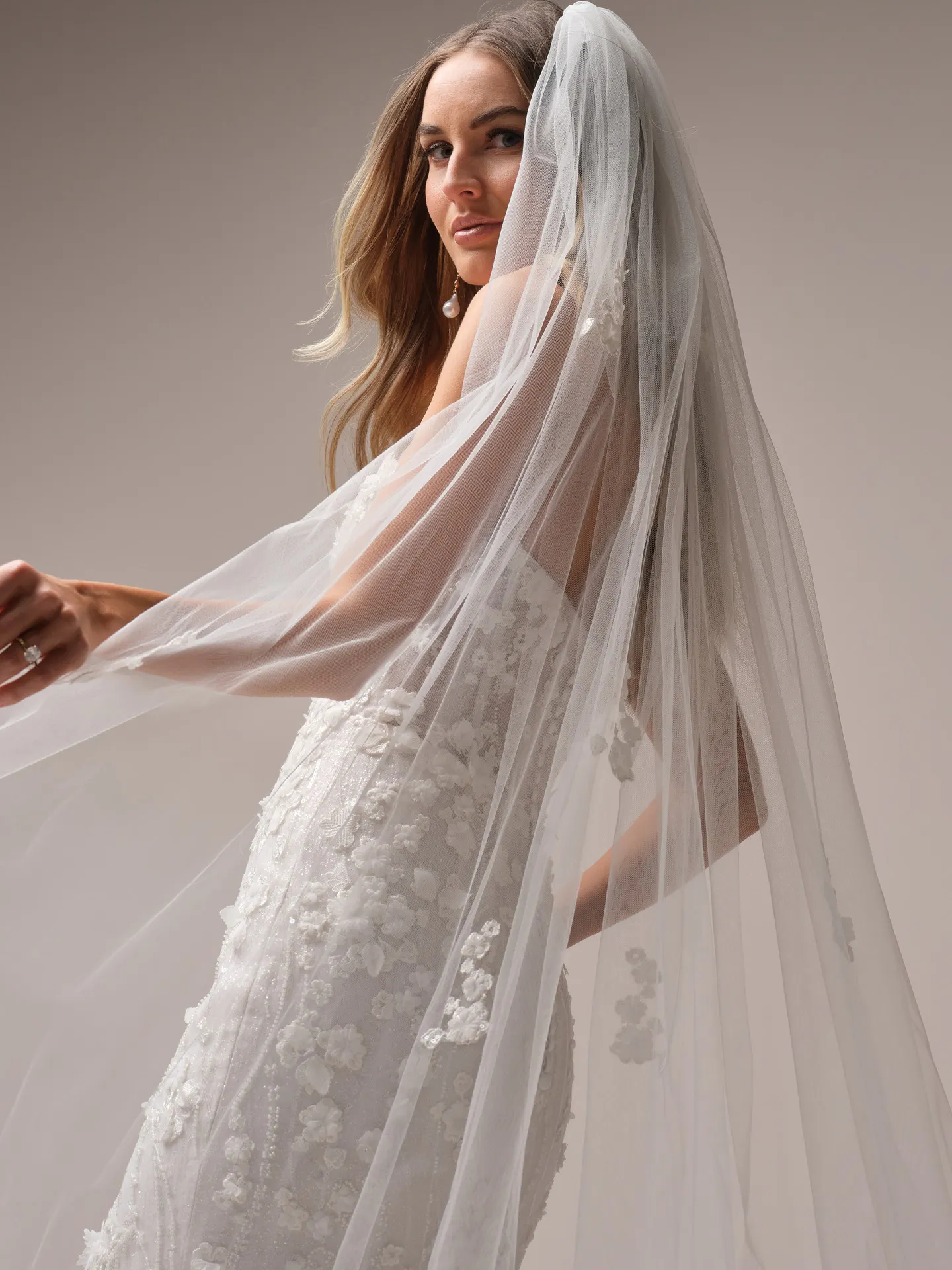 Sottero and Midgley Noor side view; floral mermaid wedding dress with veil