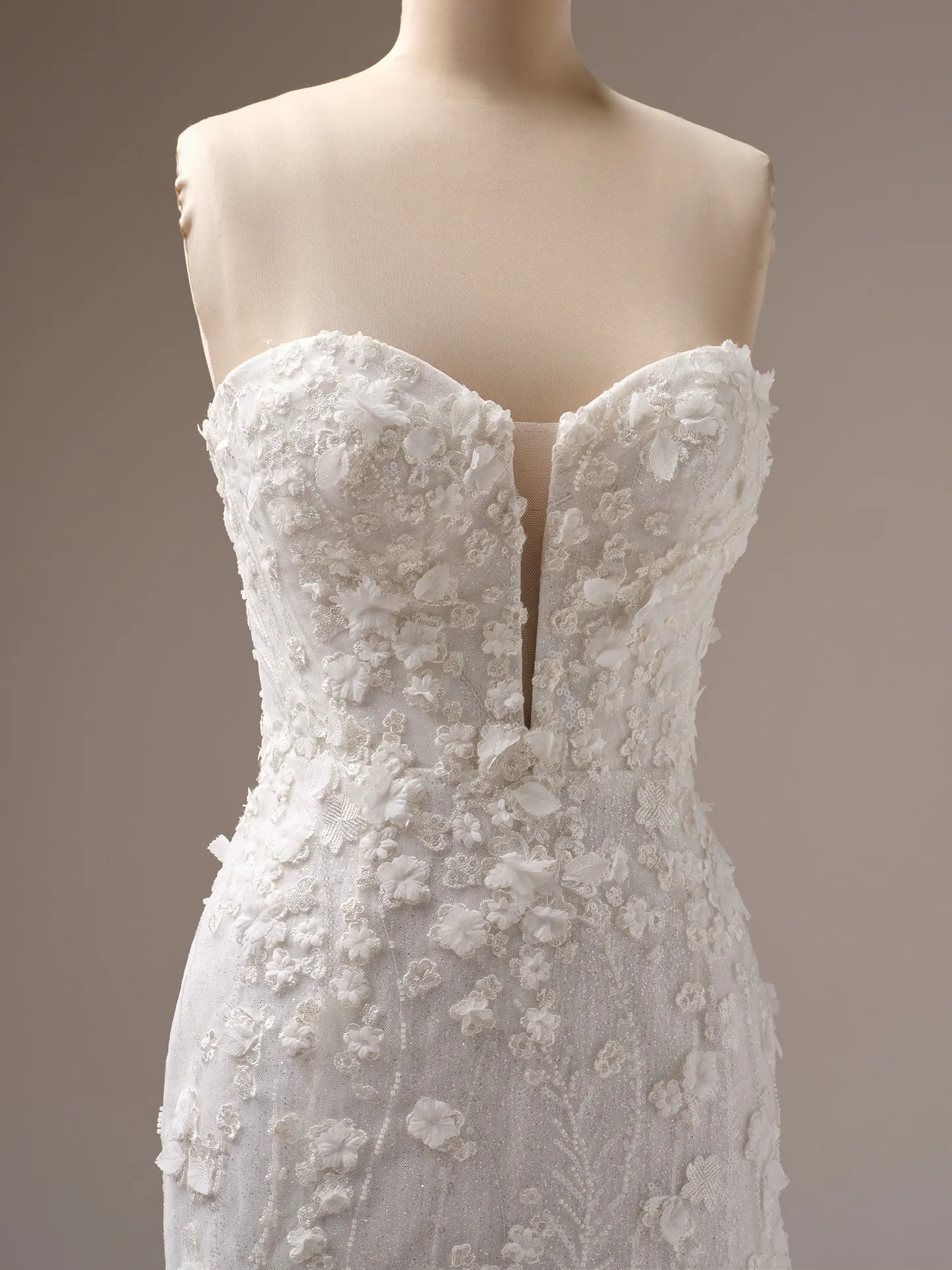 Noor mermaid wedding dress with 3D floral texture, front view.