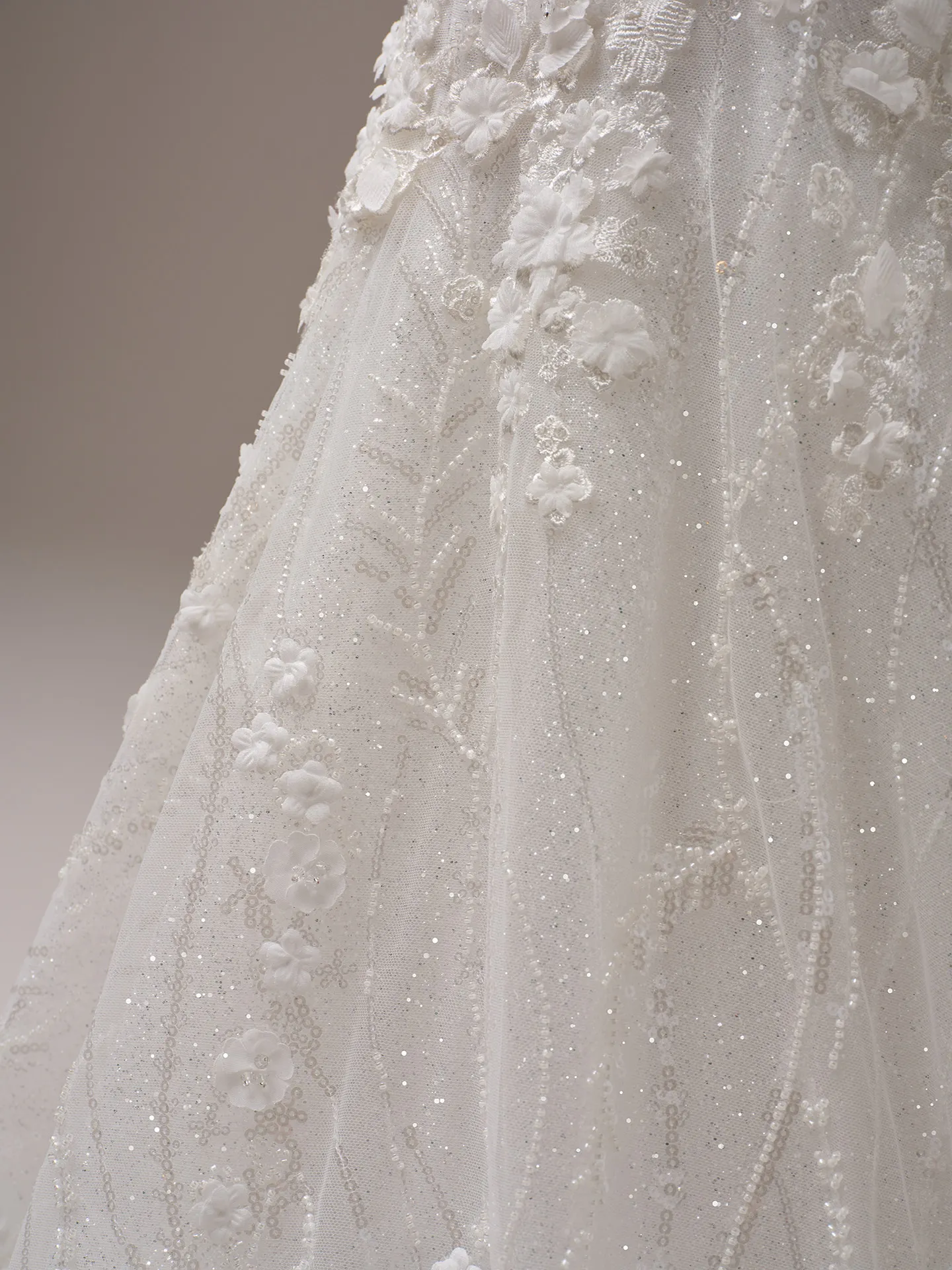 Noor sparkly mermaid wedding dress with 3-D floral details by Sottero and Midgley