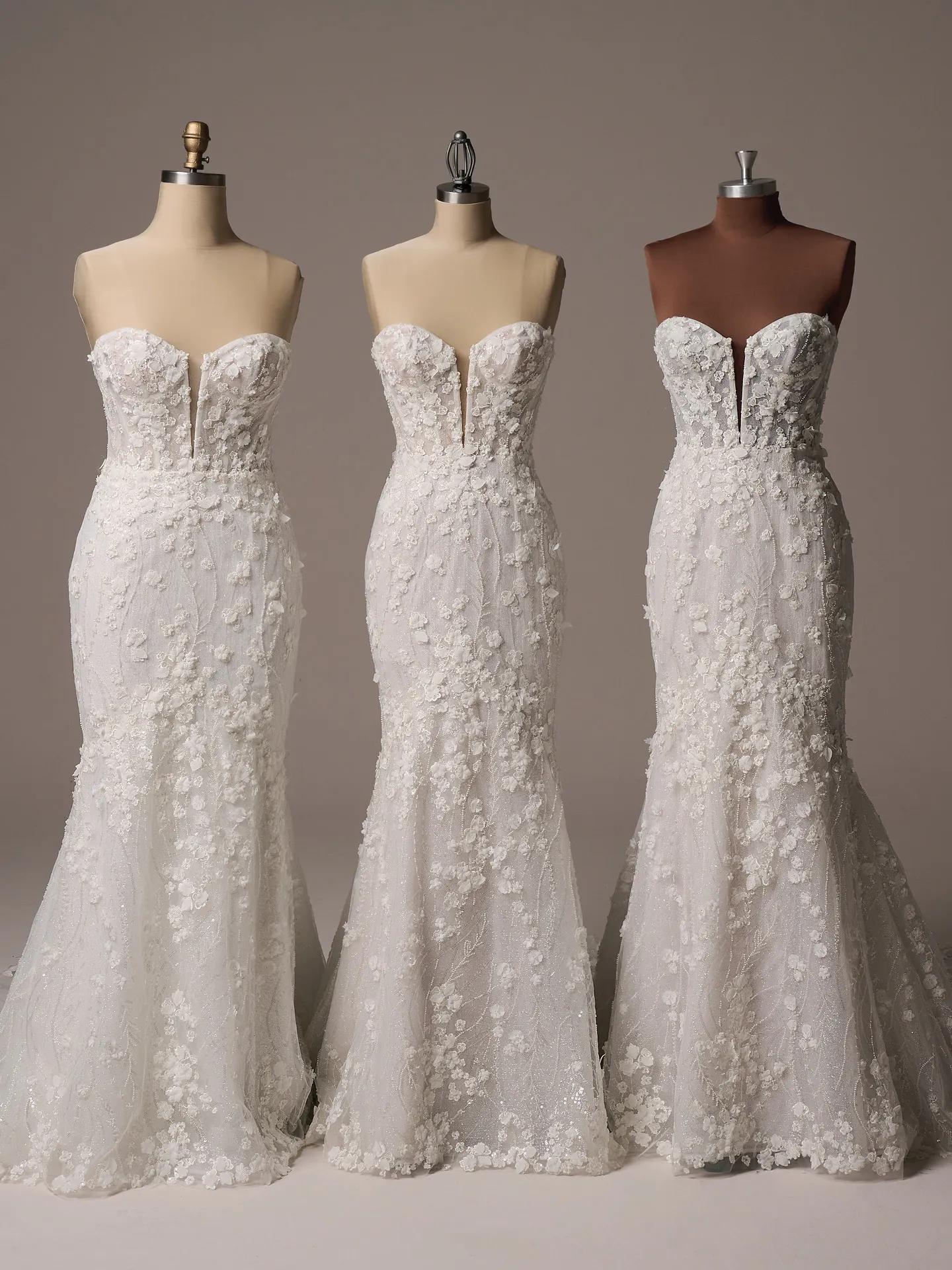 Sottero and Midgley Noor front view, floral mermaid wedding dress on mannequins.