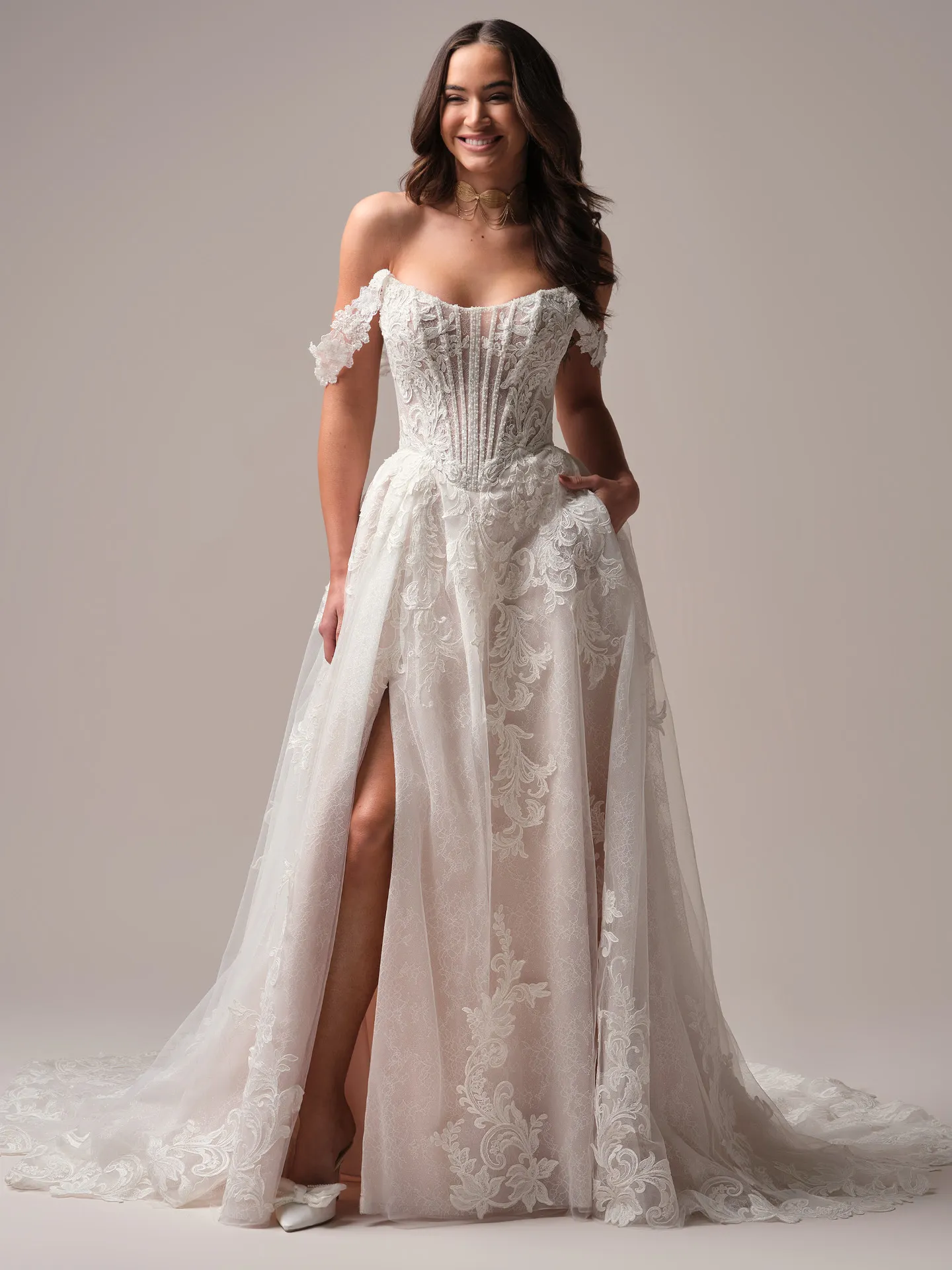 Sottero and Midgley Parker front view A-line gown with lace and exposed boning.