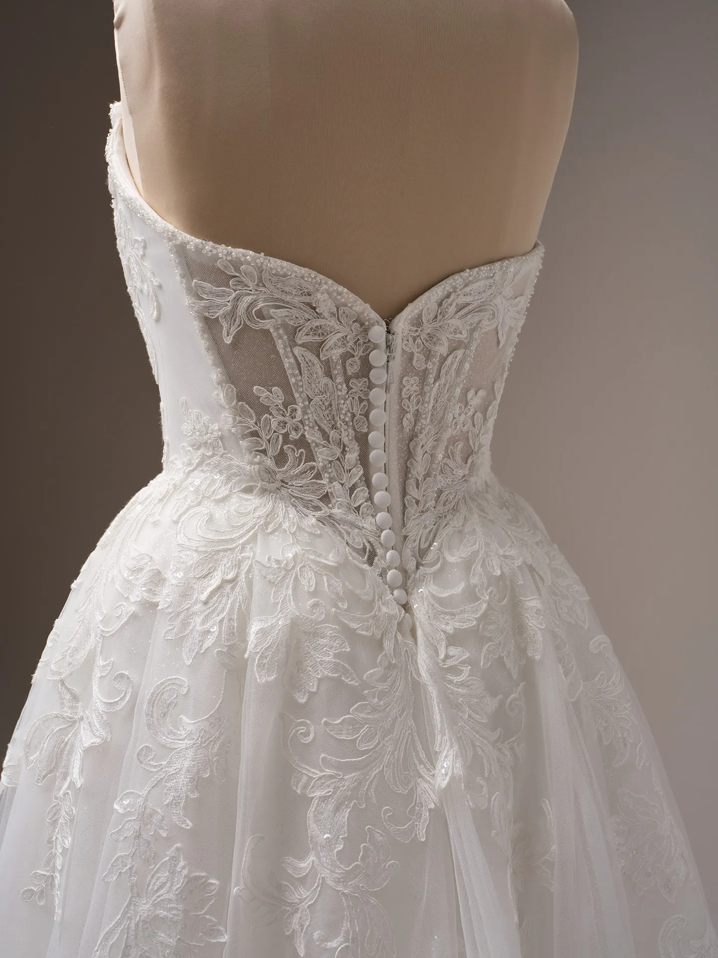 Sottero and Midgley Parker back view, lace A-line bridal gown with button details.