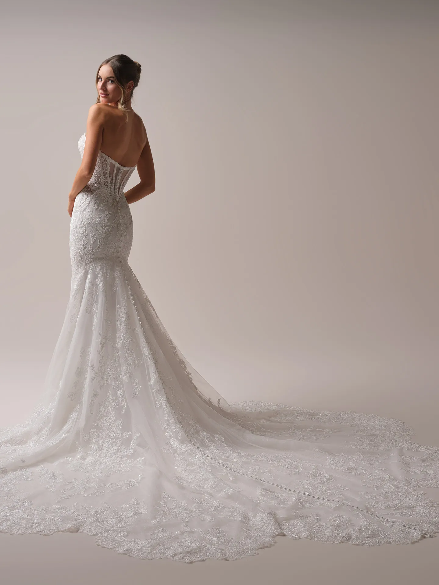 Sottero and Midgley Zareen back view mermaid bridal dress with illusion lace and scalloped train