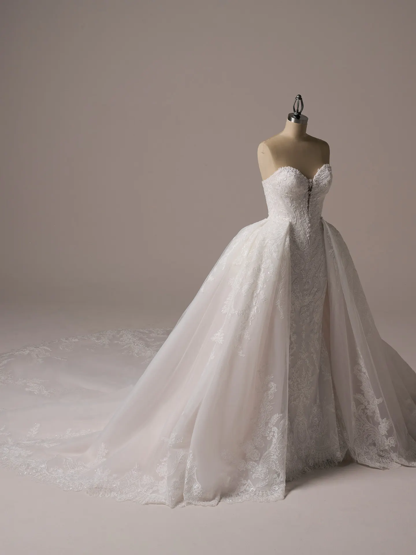Sottero and Midgley Zareen front view, illusion lace mermaid bridal dress with scalloped details.