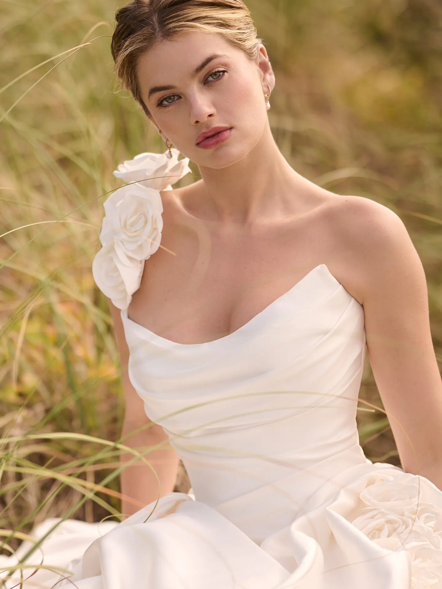 Maggie Sottero dress with satin one-shoulder strap and -D flowers front view