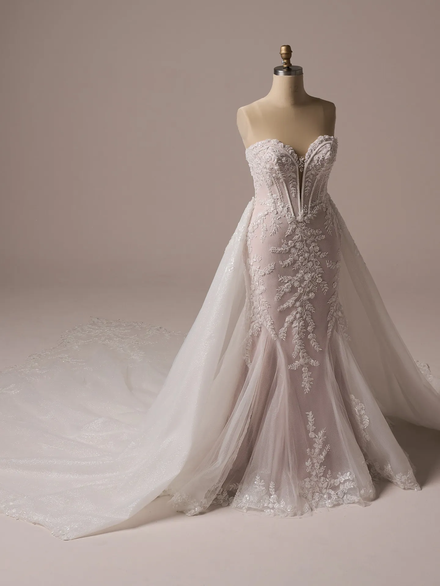 Maggie Sottero Benjie Royale front view with sparkly train, sequin and beaded motifs