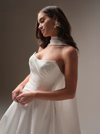 Refined Felicity Mikado wrap worn at the neck