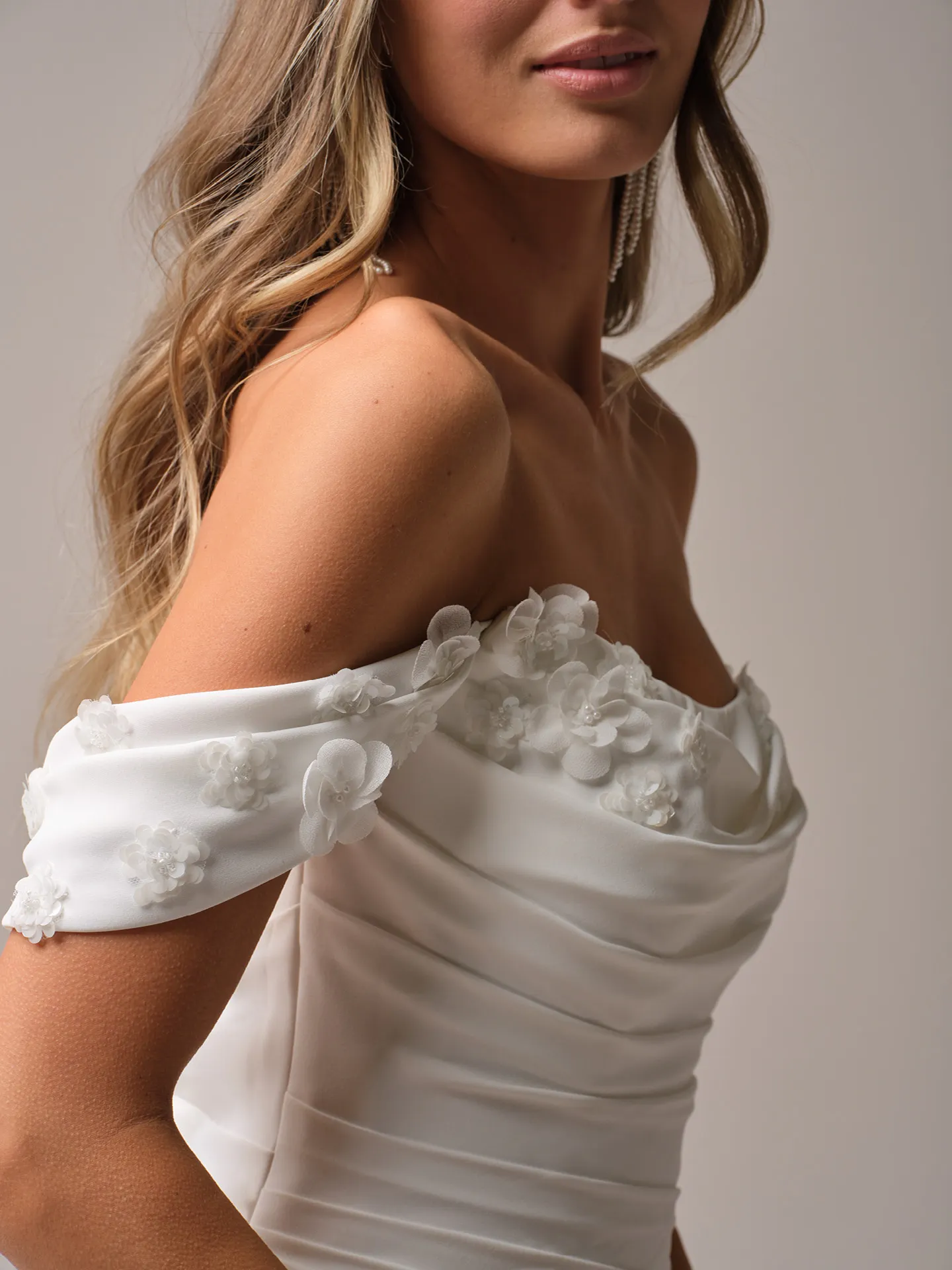 Rebecca Ingram Griselda side view, cap-sleeves with 3-D flowers.