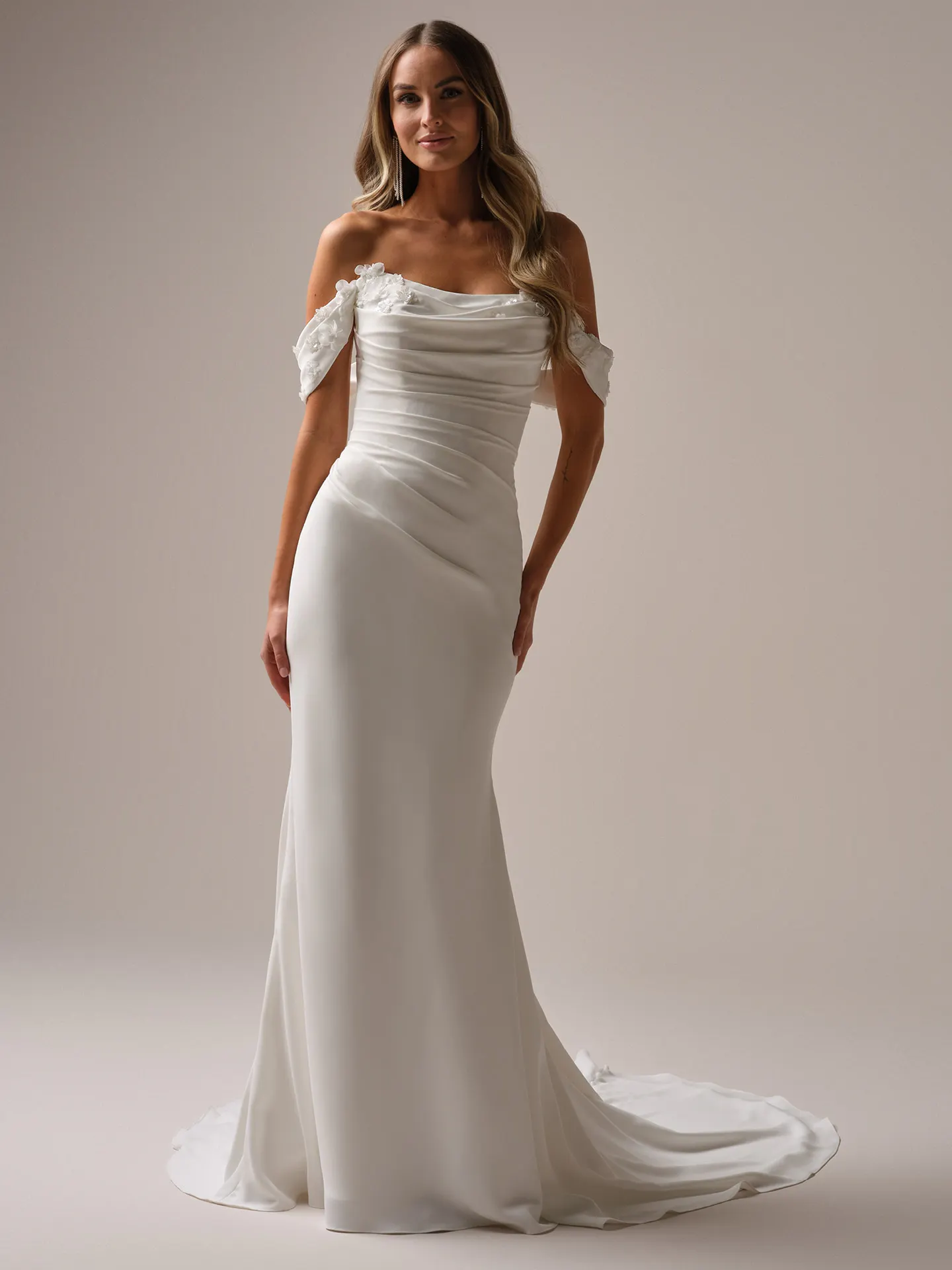 Rebecca Ingram Griselda front view with cap-sleeves and 3-D flowers.