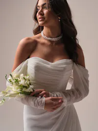 Ethereal chiffon draped long sleeves with covered buttons