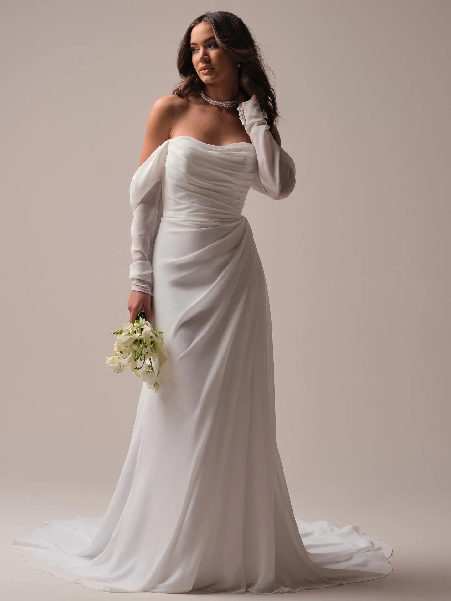 Rebecca Ingram Francesca front view with chiffon draped long sleeves and covered buttons