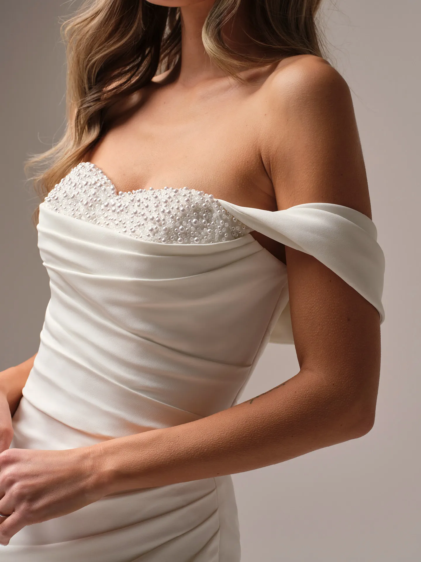 Rebecca Ingram Kathleen side view, off-the-shoulder with beaded bodice.