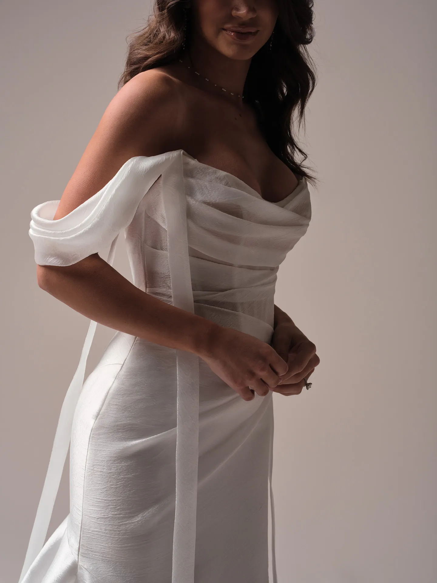 Sottero and Midgley Lagos side view with draped organza cap-sleeves and streamers