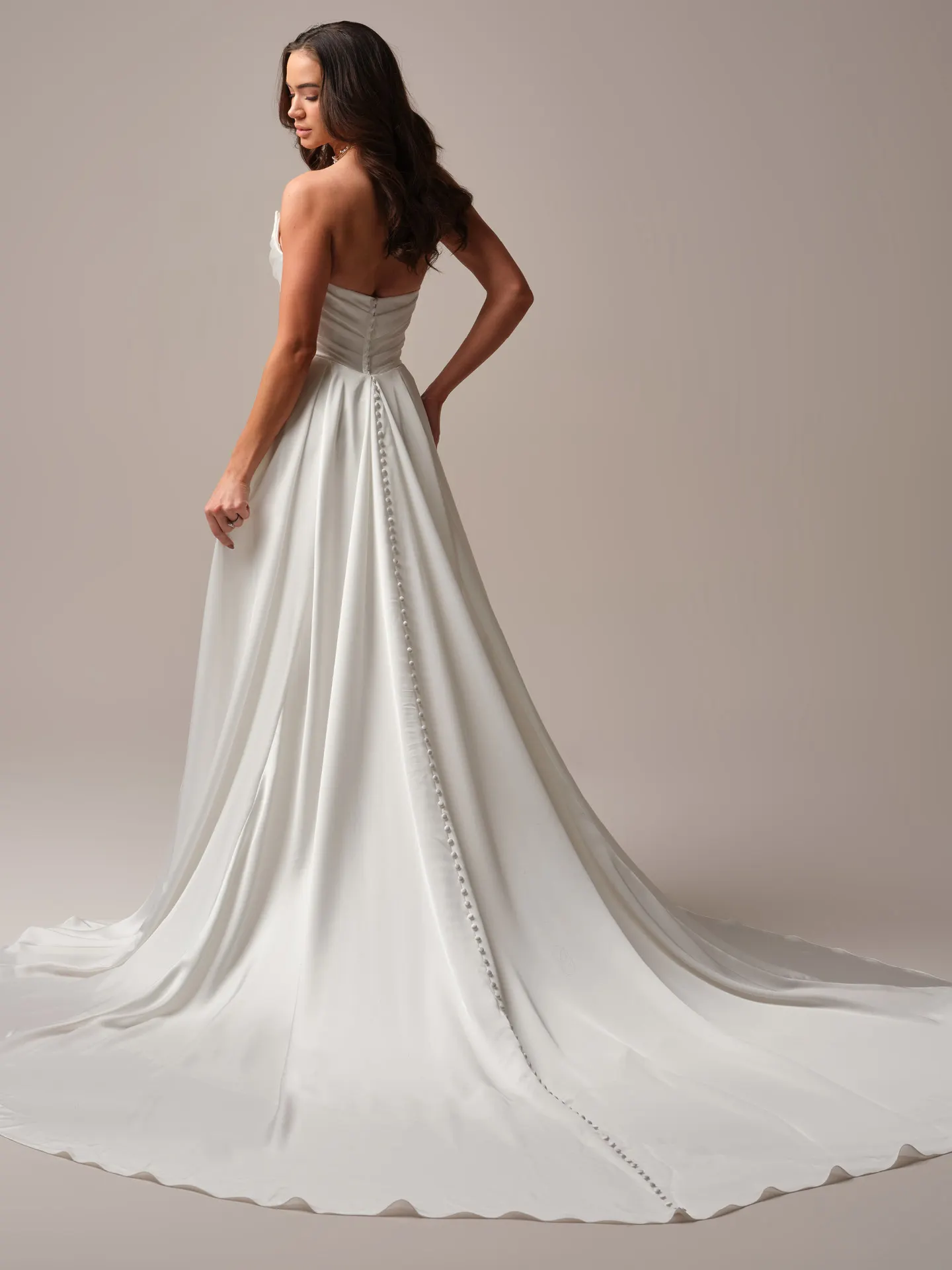 Rhianna back view, satin train with covered buttons to hem, Sottero and Midgley dress