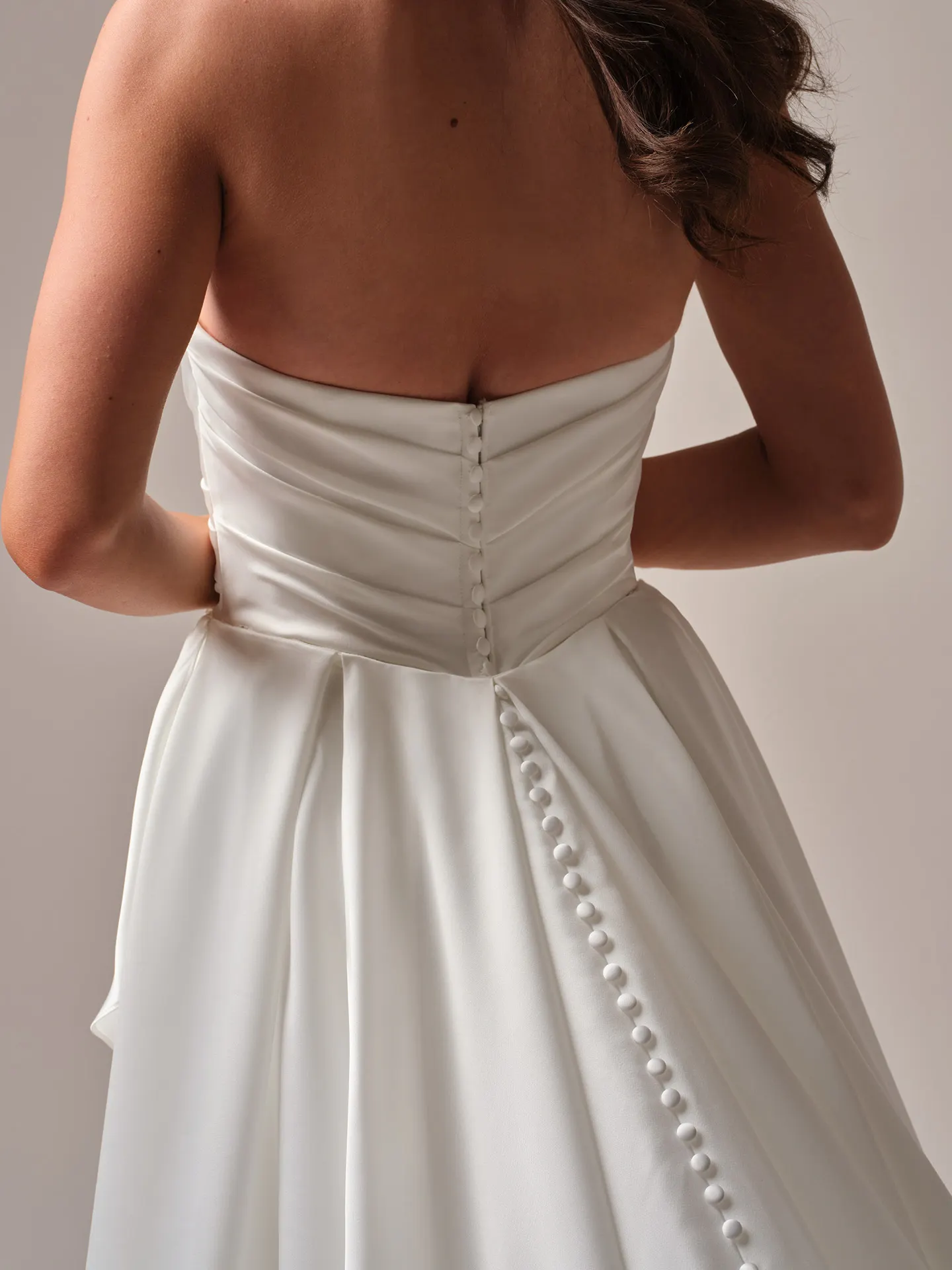 Sottero and Midgley Rhianna back view satin dress with covered buttons.
