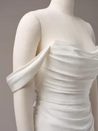 Sophisticated unembellished ruched Trento satin cap-sleeves