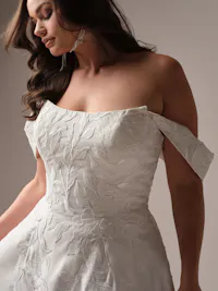 Luxe Mango satin cap-sleeves with unembellished motifs