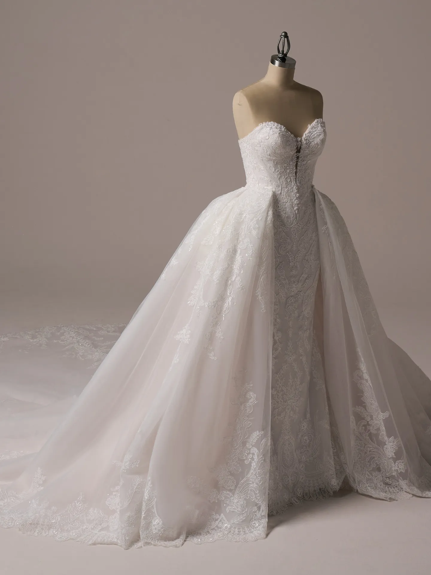 Sottero and Midgley Zareen front view, beaded lace over plain tulle on mannequin.