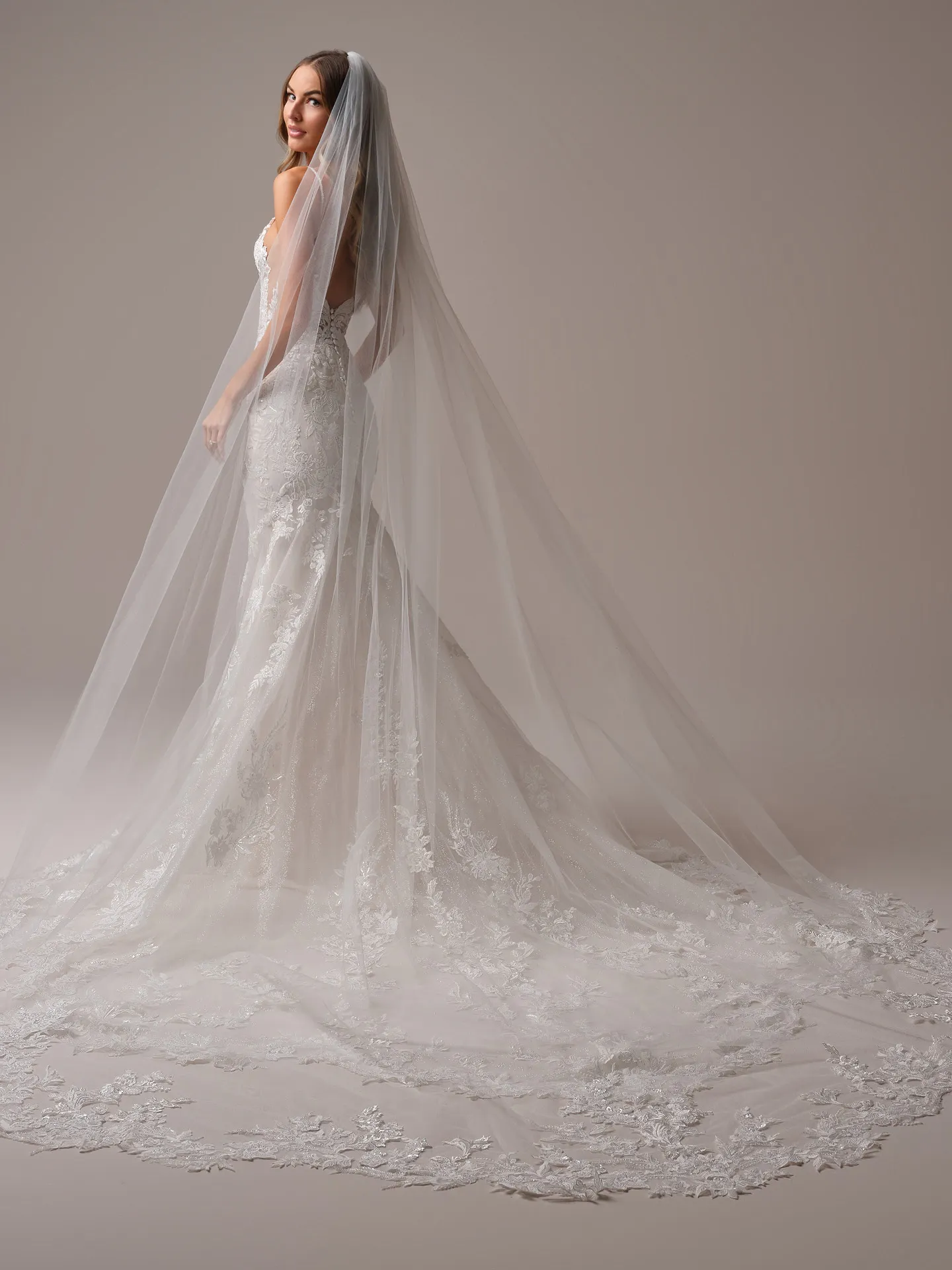 Bianca Veil back view with cathedral length and scalloped sparkly motifs Maggie Sottero