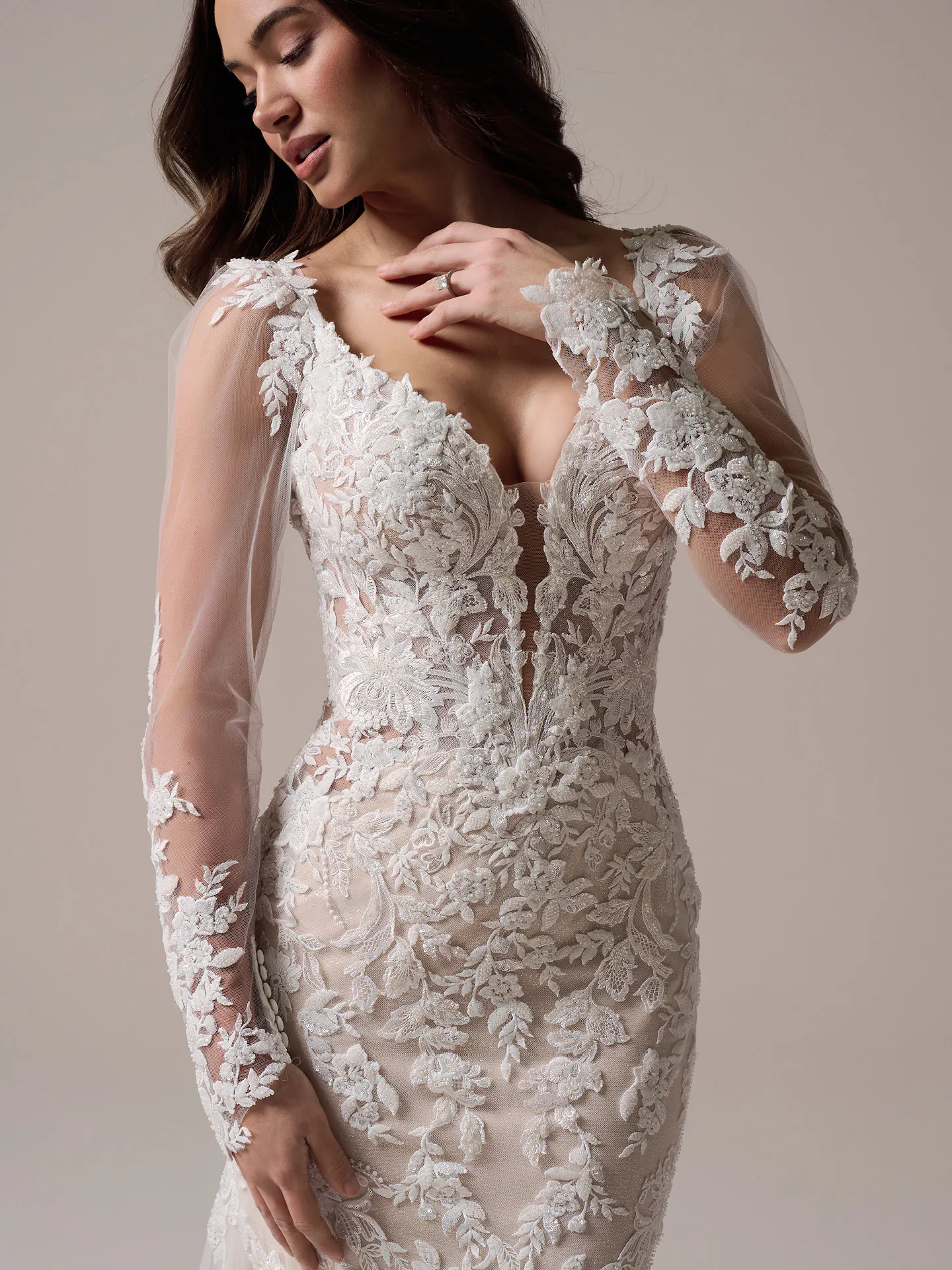 Maggie Sottero Bianca fit-and-flare gown, front view, floral lace, sheer sleeves
