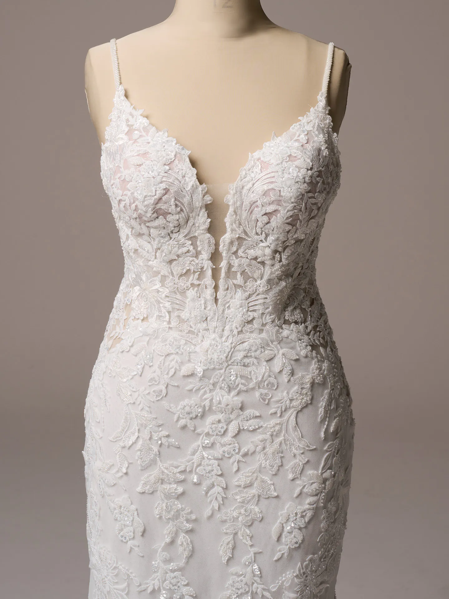 Bianca fit-and-flare gown front view with beaded lace and plunge neckline by Maggie Sottero