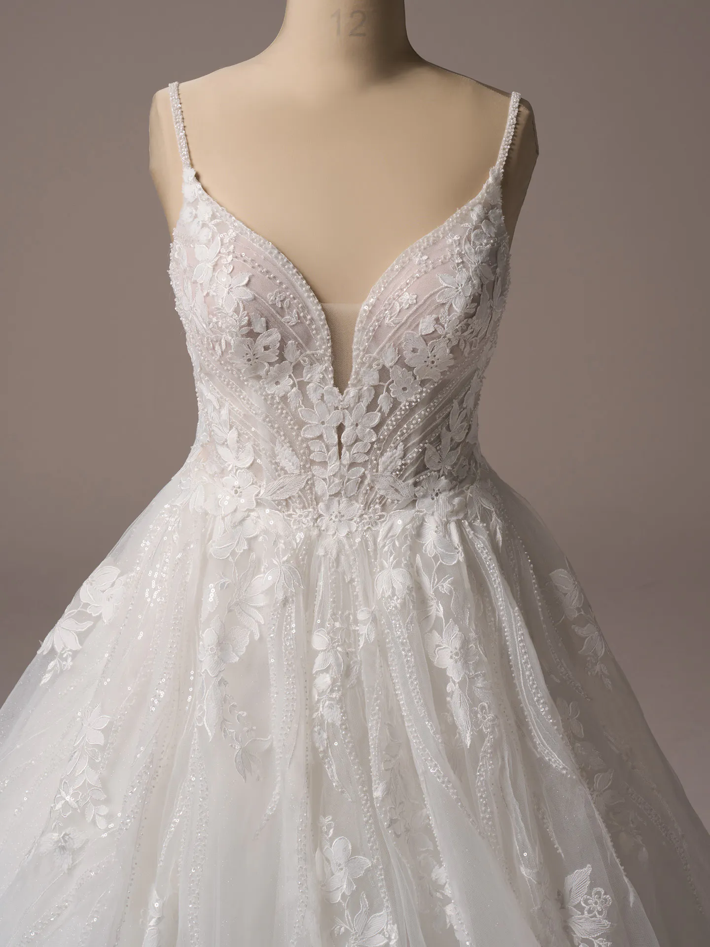 Maggie Sottero Juneau sheer lace jacket overlay front view detail