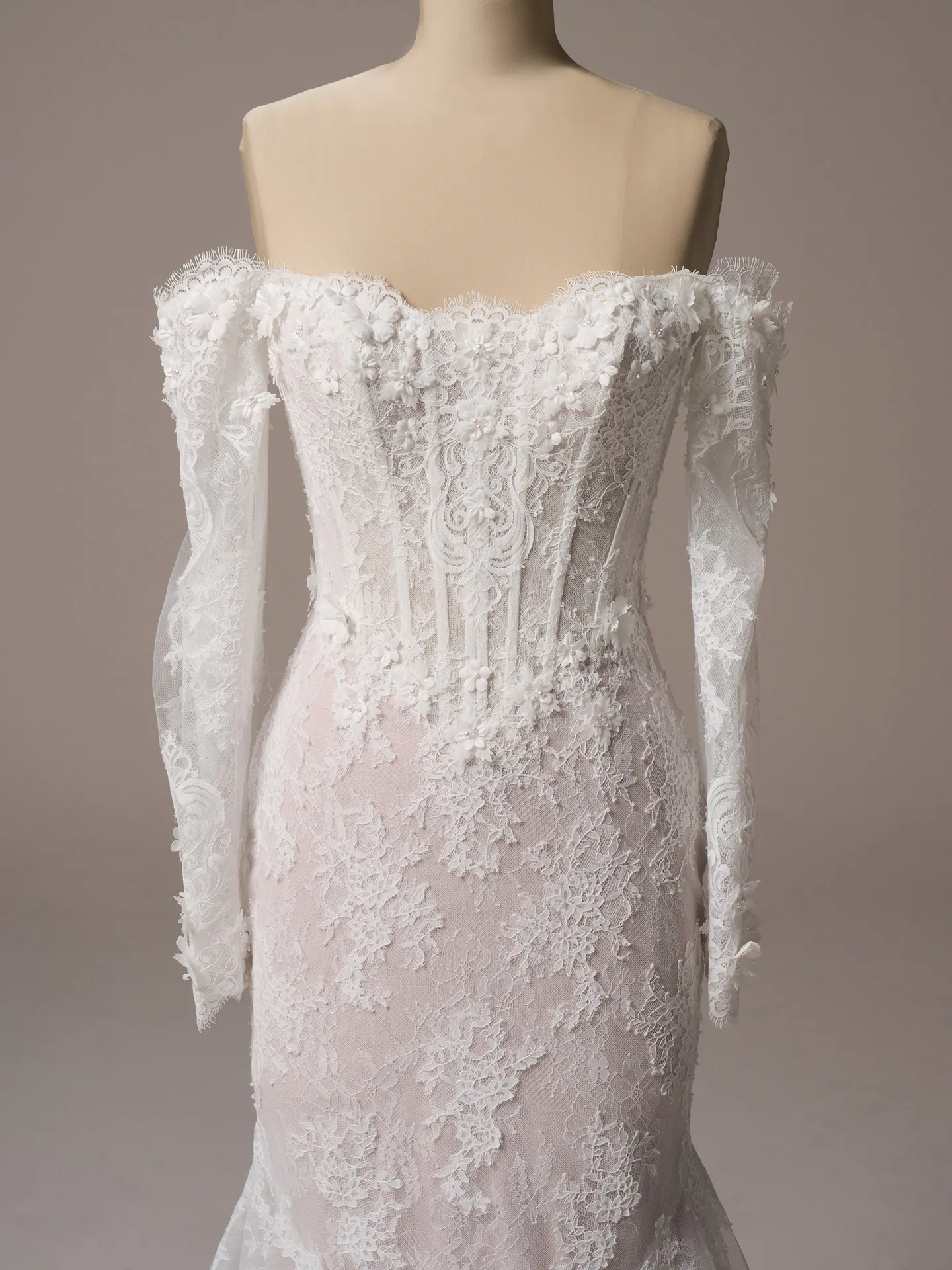 Maggie Sottero Takera fit and flare wedding dress front view in soft ivory lace
