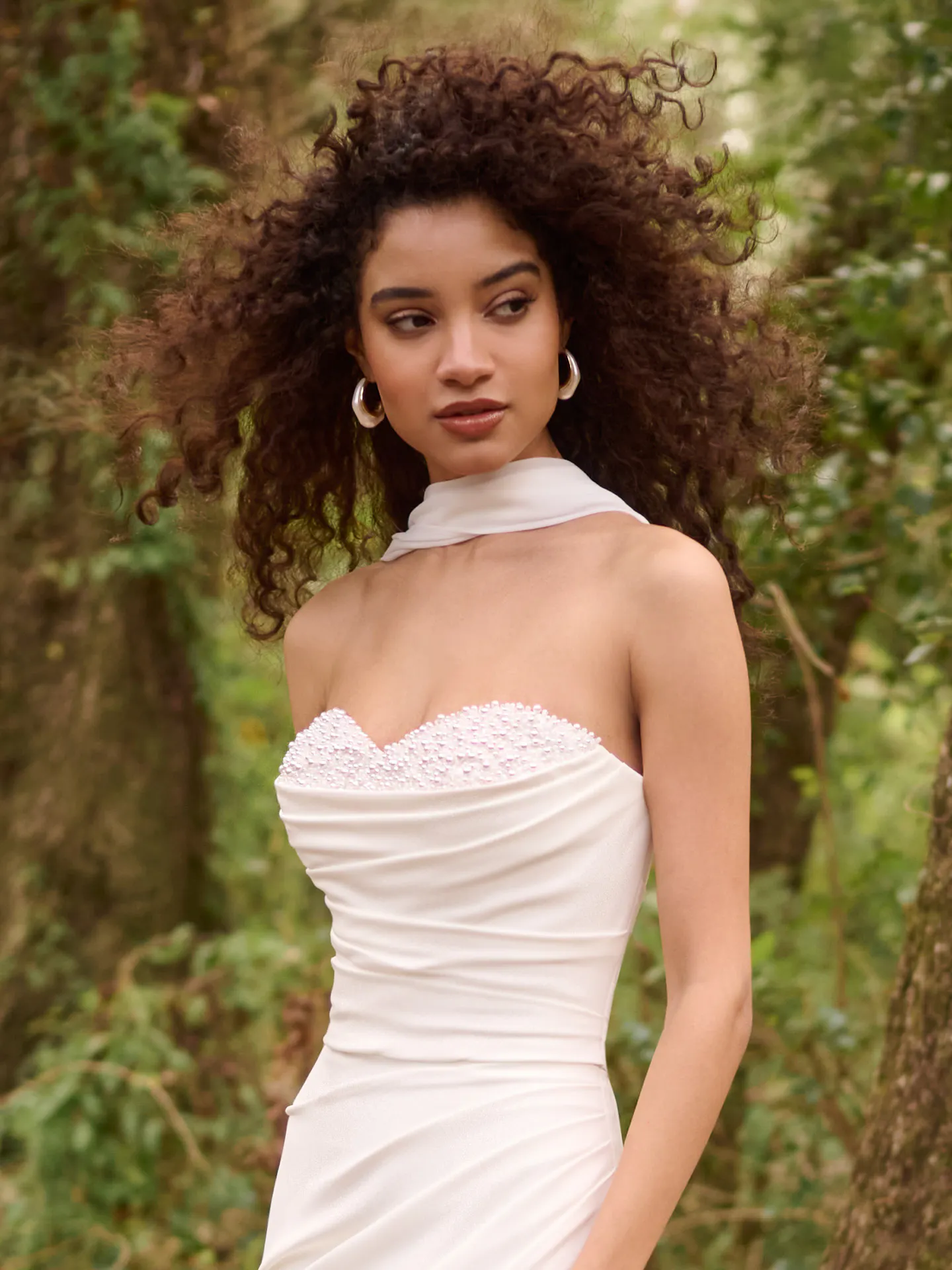 Rebecca Ingram Kathleen dress front view with detachable shoulder wrap in forest setting