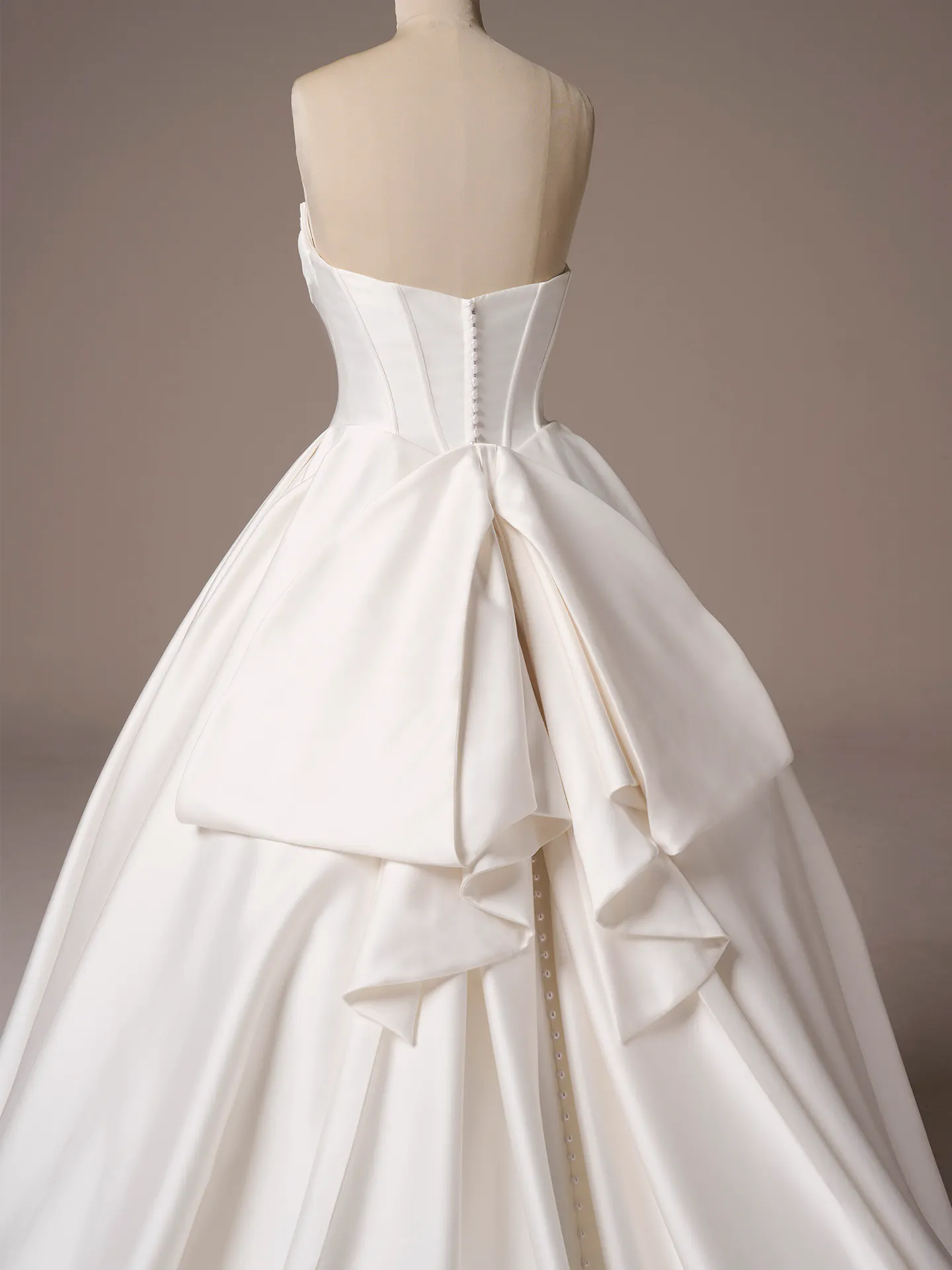 Maggie Sottero Juneau ballgown wedding dress back view with full skirt train