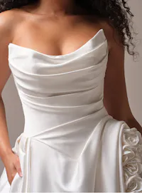 Maggie Sottero ballgown wedding dress front view with floral detail and draped neckline