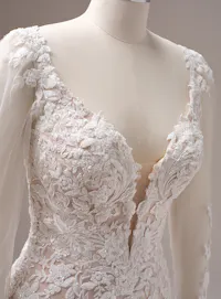 Maggie Sottero Bianca front view floral lace fit-and-flare wedding gown with sheer sleeves