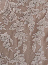 Bianca beaded lace detail Maggie Sottero wedding gown fabric close-up