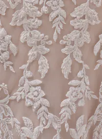 Lace floral detail of the Bianca beaded fit-and-flare wedding gown by Maggie Sottero