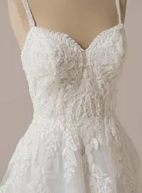 Rebecca Ingram Carmen dress front view with lace details and spaghetti straps