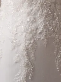 Eloise dress close-up of beaded lace detail, fit-and-flare style, Maggie Sottero