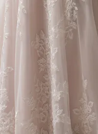 Lace detail of Everleigh off-the-shoulder A-line dress by Maggie Sottero