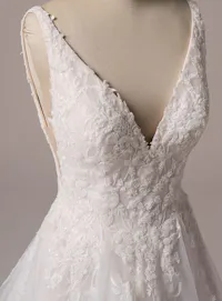 Rebecca Ingram Honor V-neck A-line gown with floral lace detailing front view