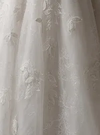 Sottero and Midgley Maritza floral shimmer A-line gown detailed close-up.