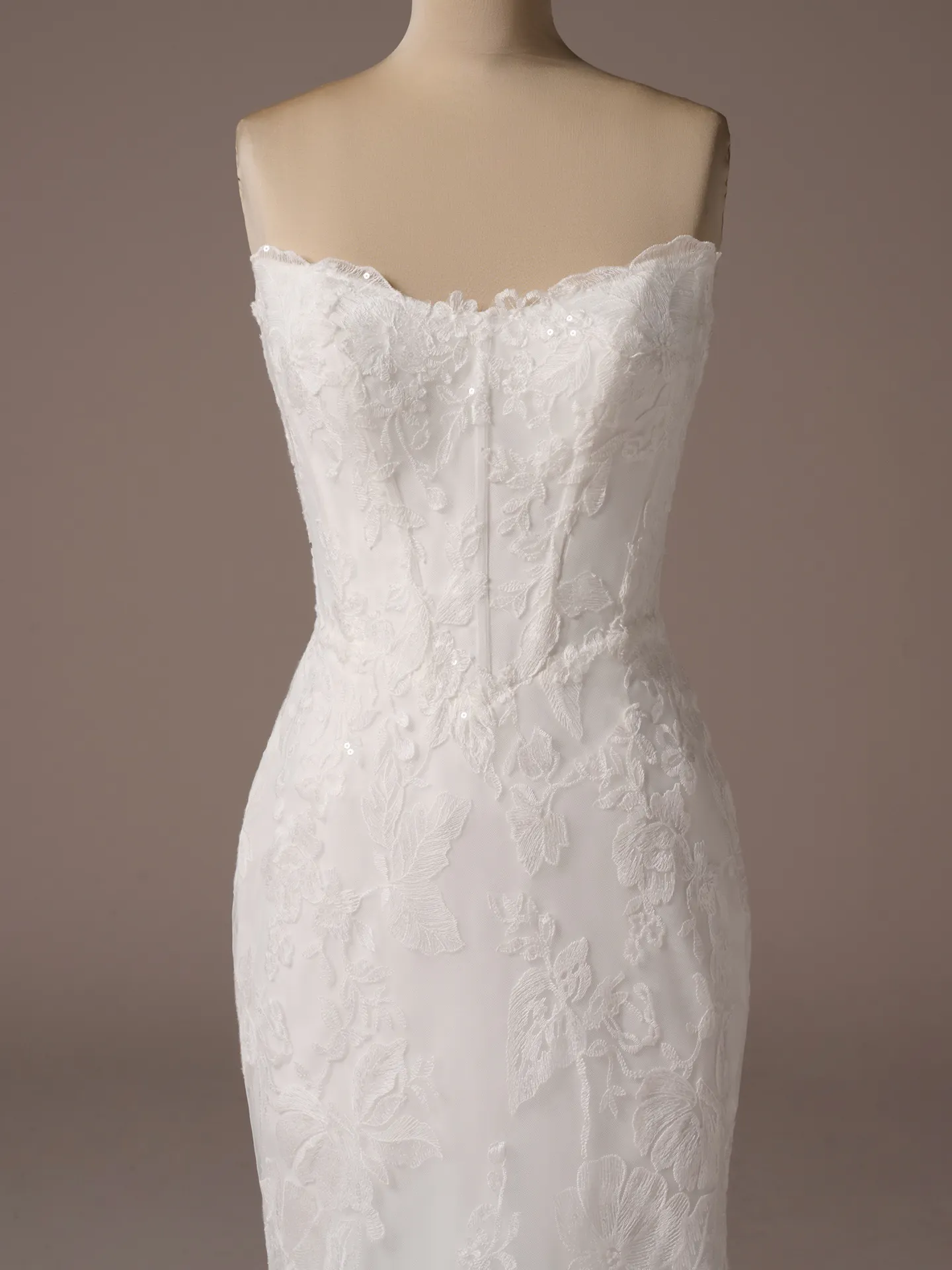 Maggie Sottero Meredith fit and flare wedding dress front view in ivory tone lace