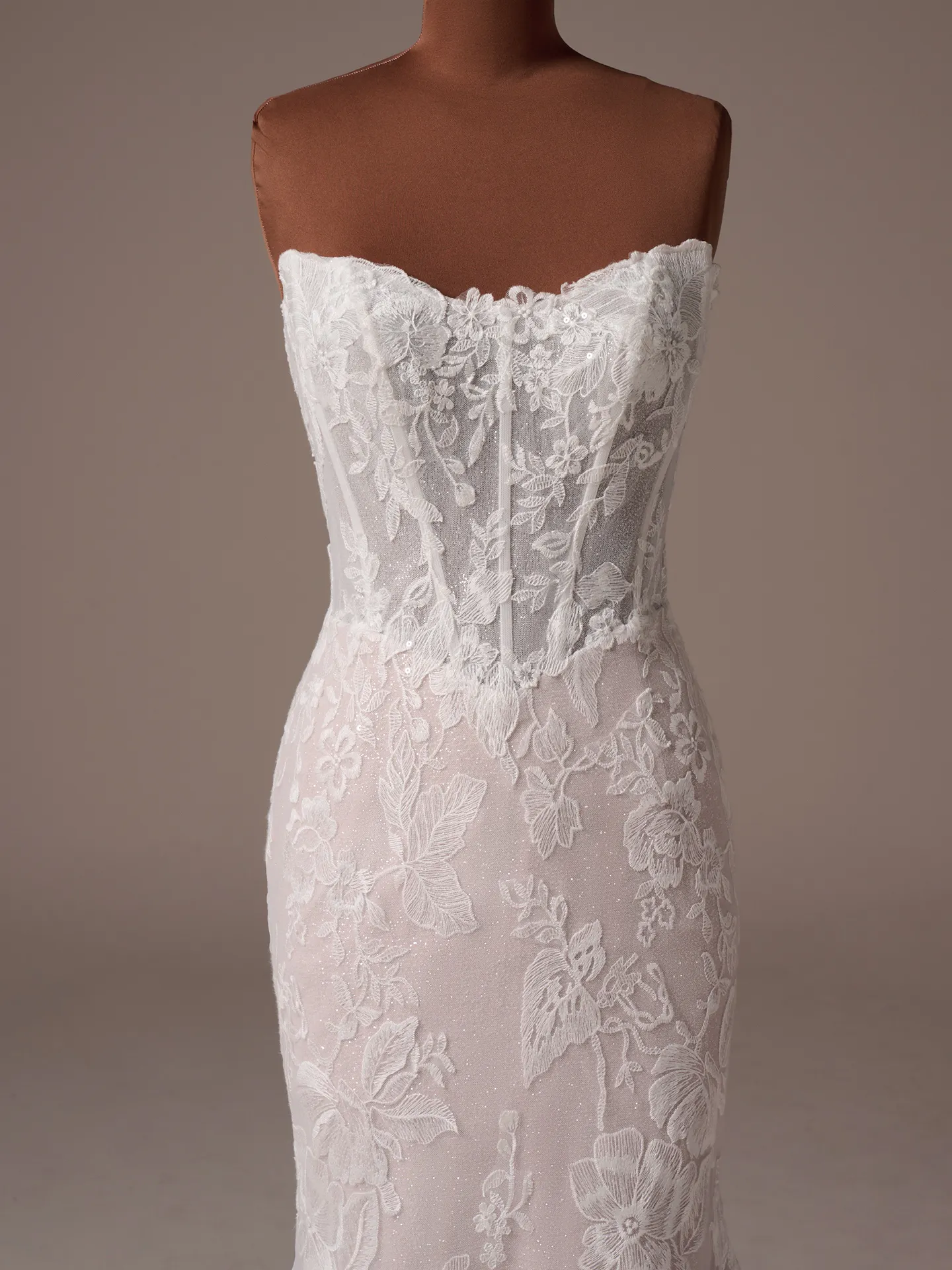 Maggie Sottero Meredith fit and flare wedding dress front view in mocha tone lace