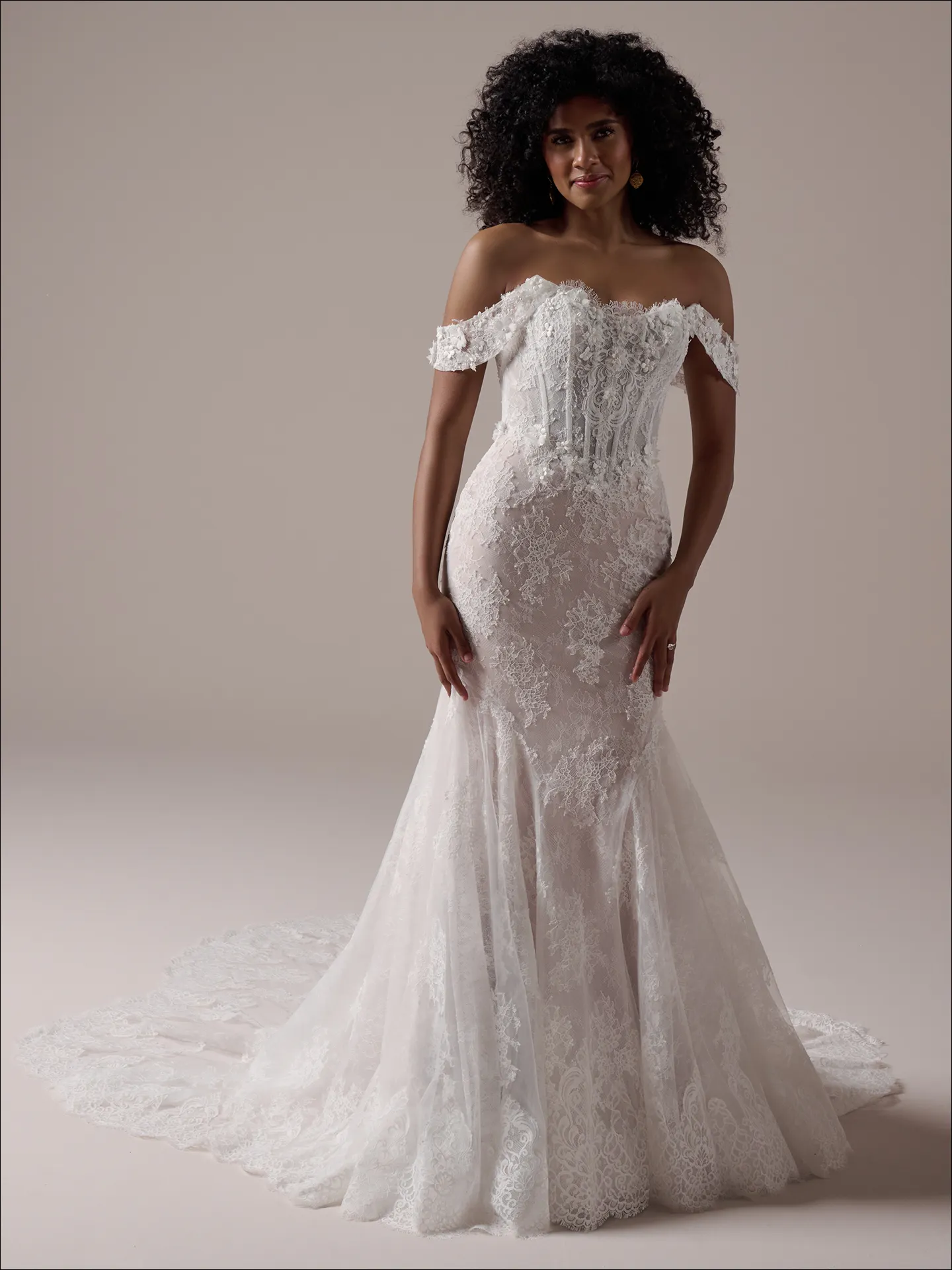 Maggie Sottero Takera fit and flare wedding dress back angle with extended train