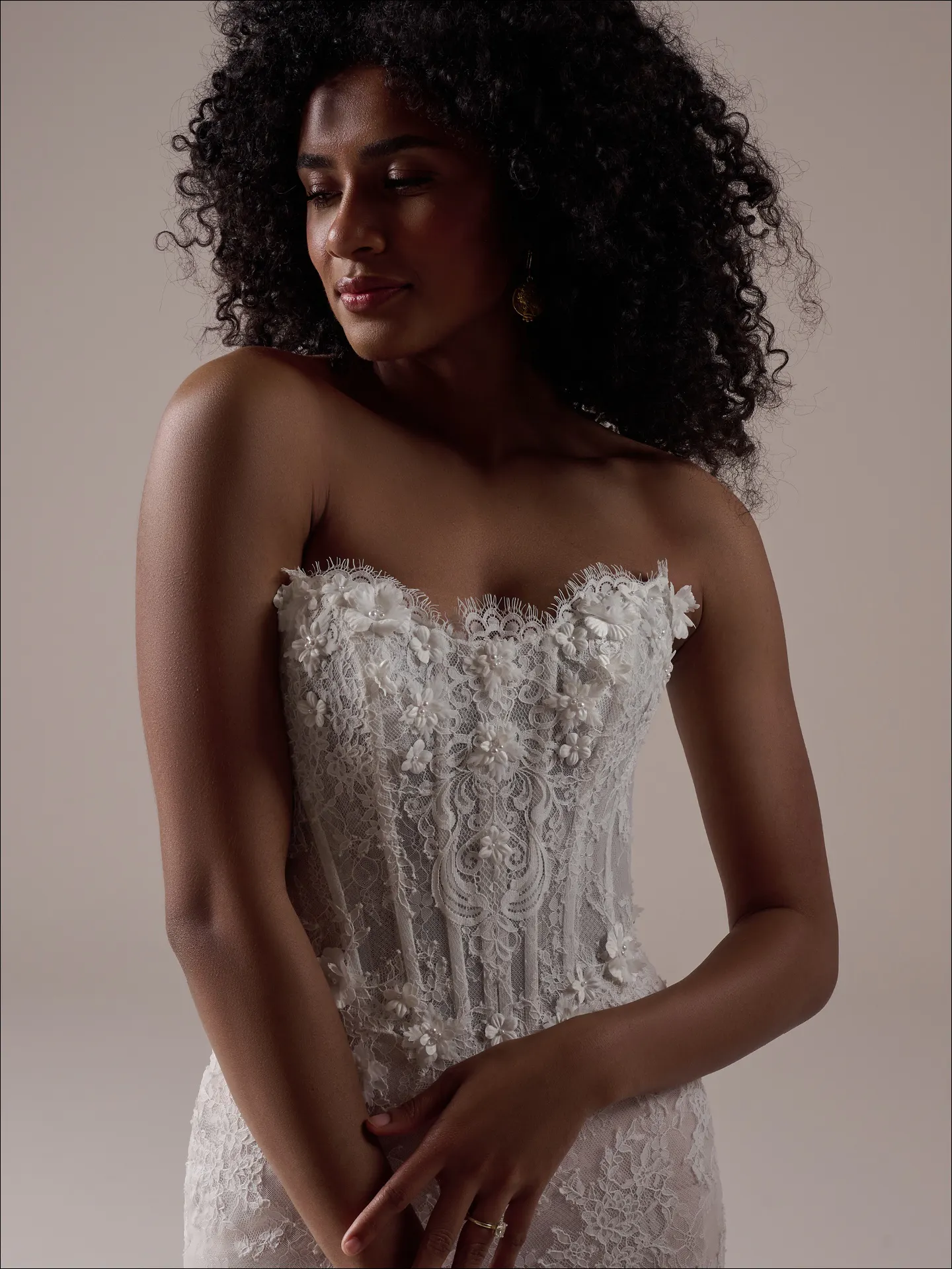 Maggie Sottero Takera fit and flare wedding dress side profile with sculpted fit