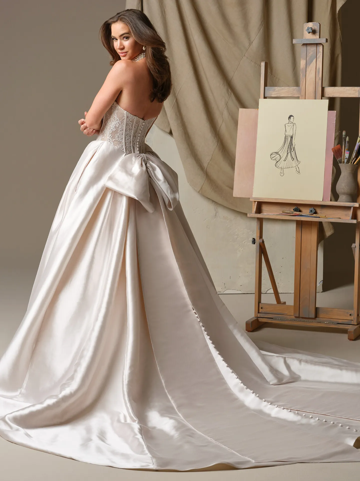 Maggie Sottero Ashland ballgown, back view with bow detail.