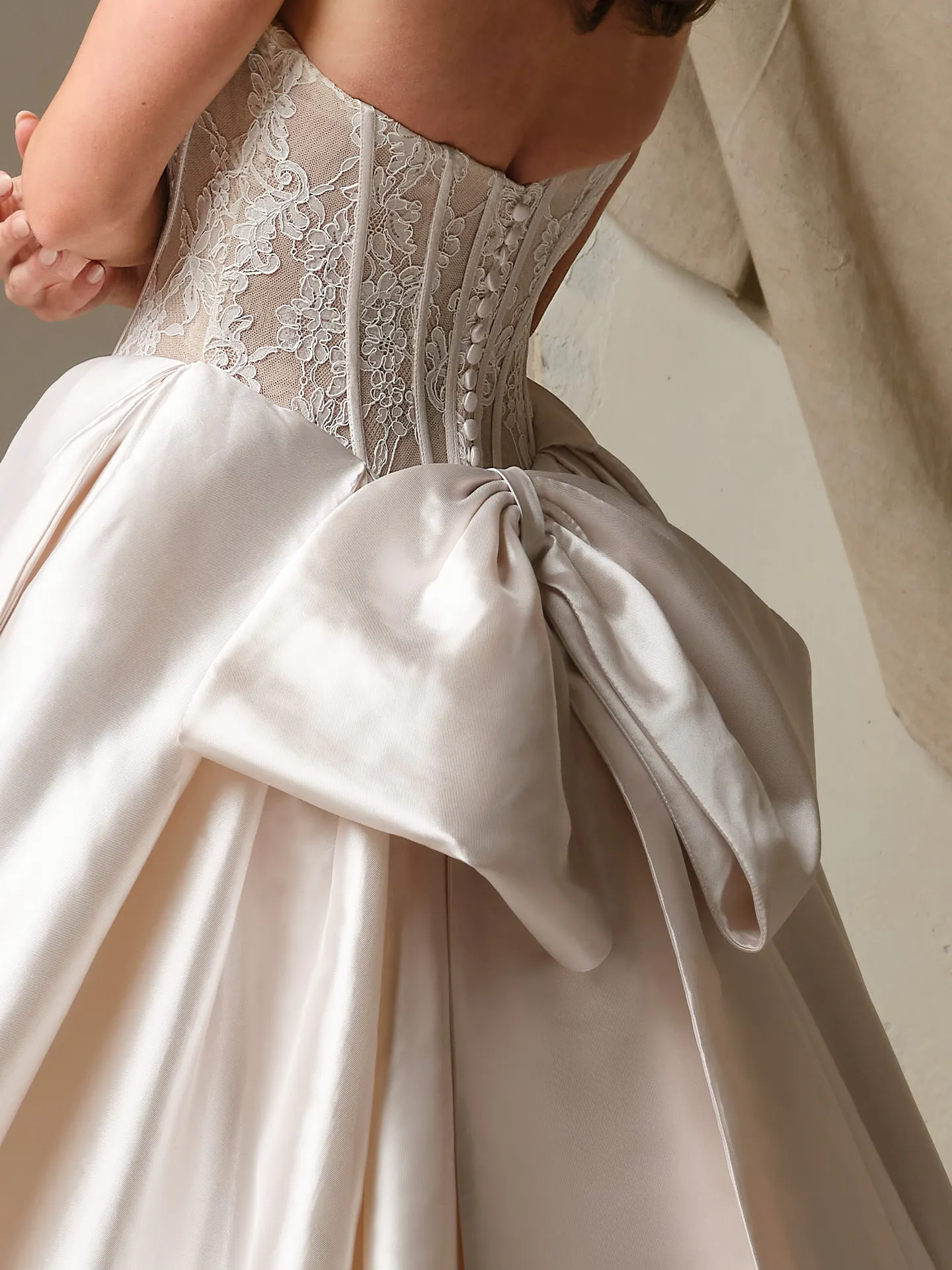 Maggie Sottero Ashland detachable bow, front view.