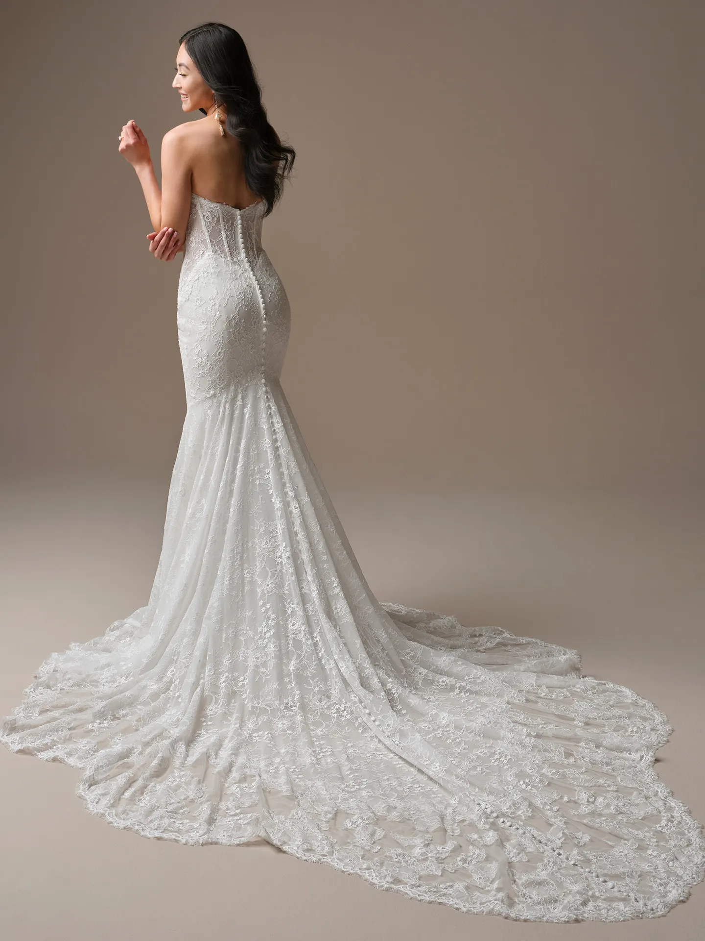 Maggie Sottero Bellevue, back view strapless lace mermaid wedding dress.
