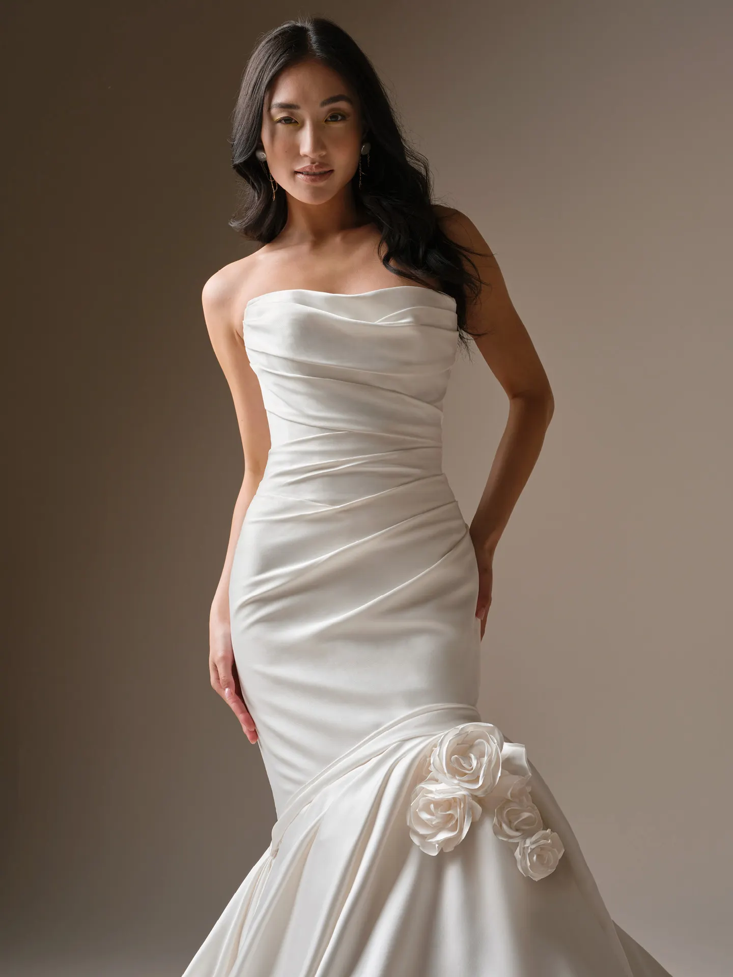 Maggie Sottero Emelina strapless satin fit-and-flare wedding dress, front view.