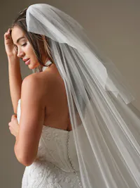 Essentials Edit - Sparkling tulle adds shimmer and glamour, making this Maggie Sottero veil a radiant highlight of your wedding day look.